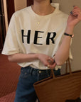 Her Tee